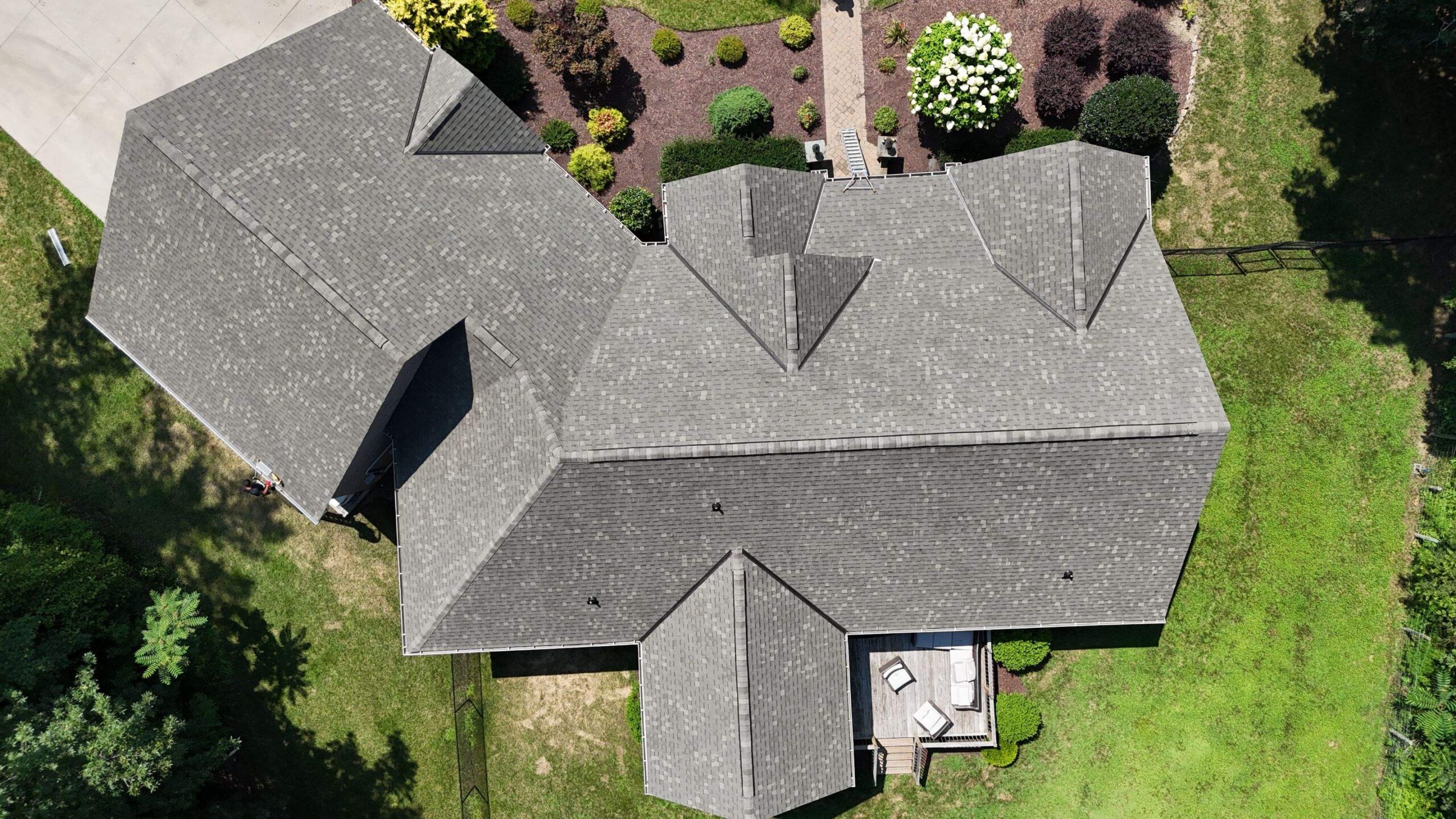 drone shot of the new asphalt shingle roof replacement on this High Point, North Carolina home